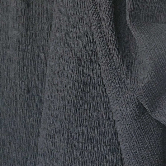 Black Knit With A Crinkled Texture