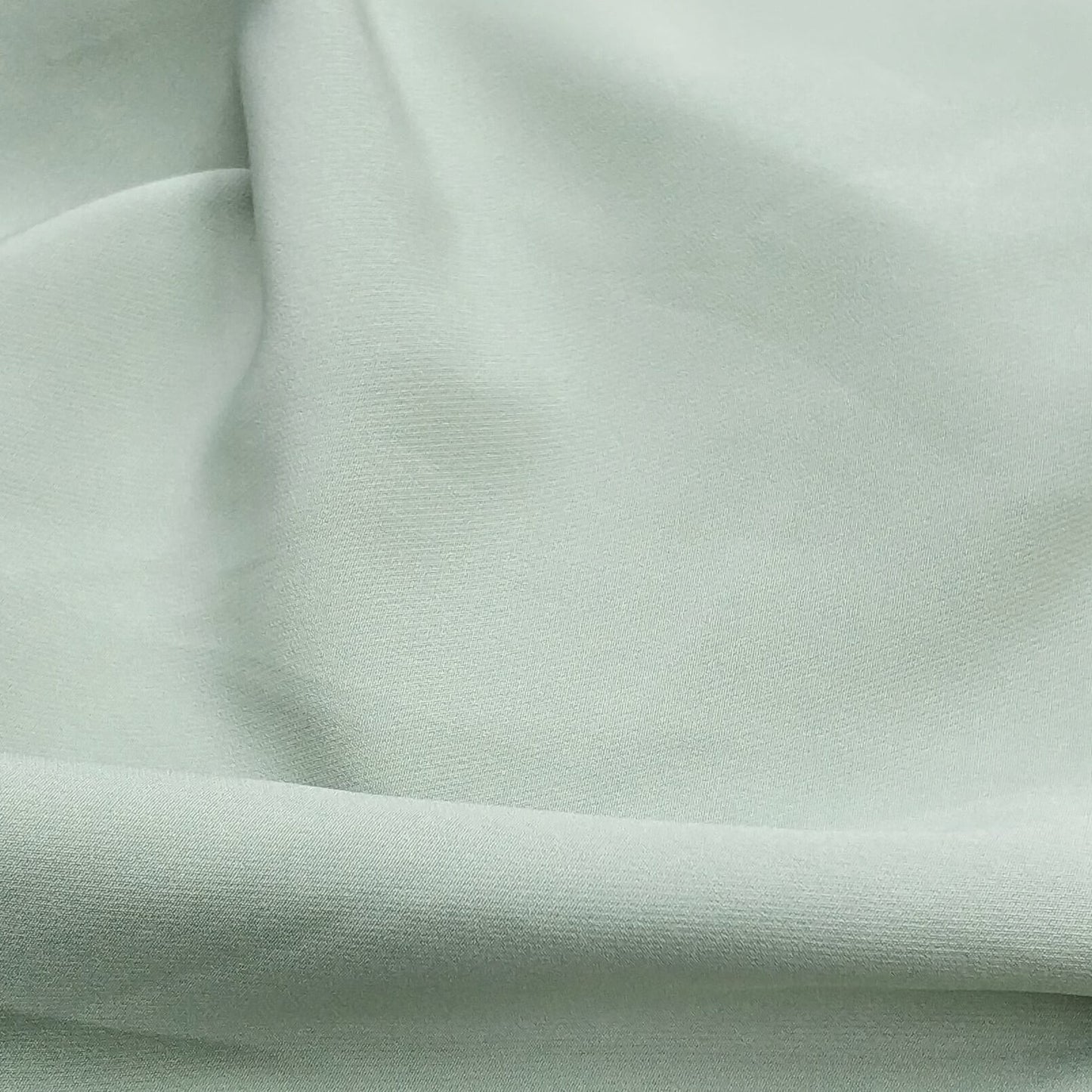 Woven Fabric With Slight Stretch In Light Green Color