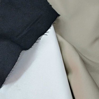 Black, White and Beige Woven Fabric