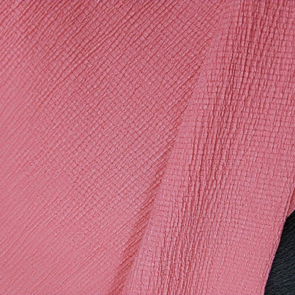 Crepe-Style Knit Featuring A Gentle Crinkled Texture In Coral Pink Color