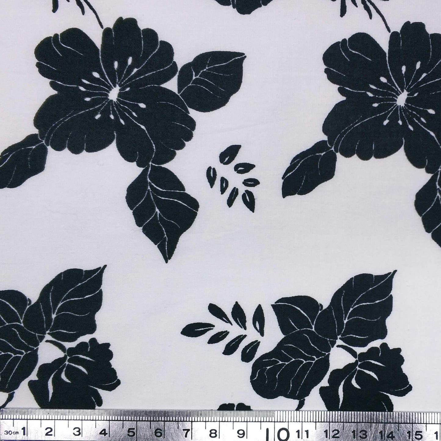 Black Flowers on a White Backround Cotton Poplin with Lycra