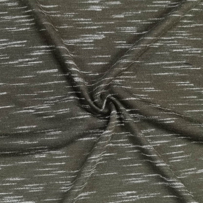 Green Fabric With White Speckles