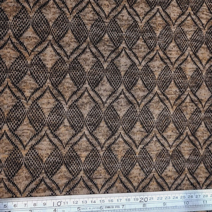 Textured fabric with a geometric pattern in black and brown
