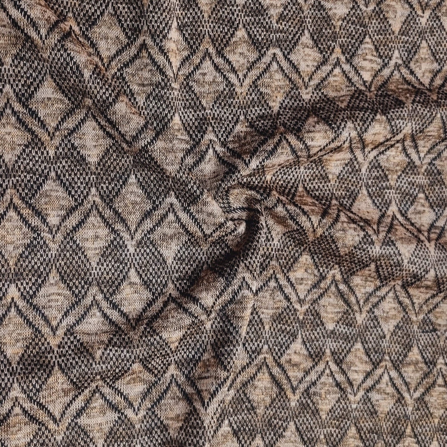 Textured fabric with a geometric pattern in black and brown