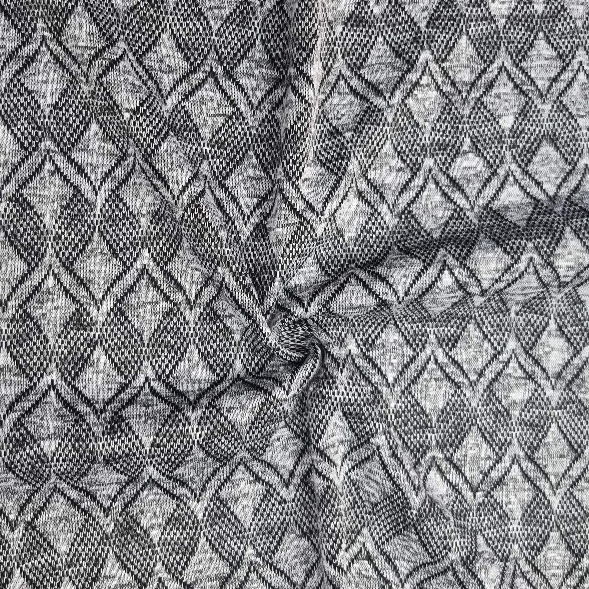 Textured fabric with a geometric pattern in black and gray