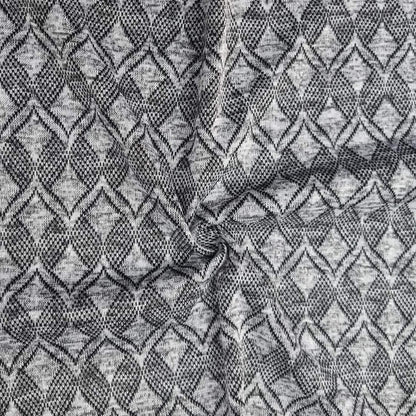 Textured fabric with a geometric pattern in black and gray
