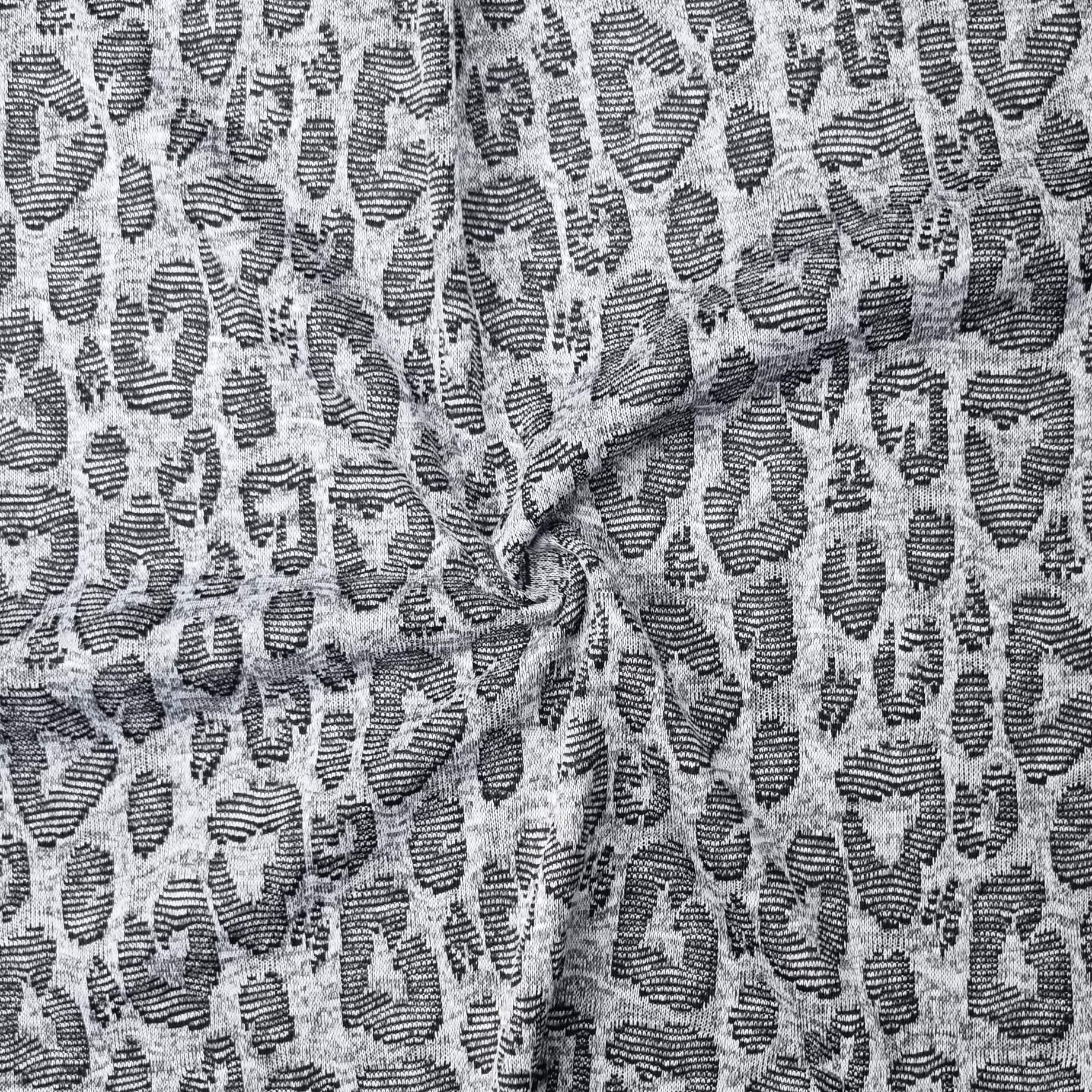 close-up of Jacquard fabric with a leopard print pattern in gray