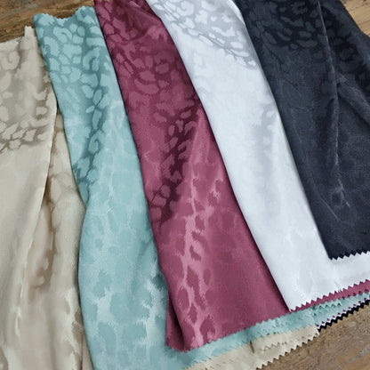 Satin Fabrics Featuring A Leopard Print In Varius Colors