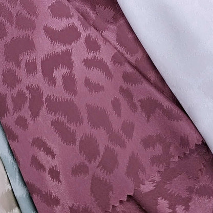  Satin Fabric Featuring Leopard Print In Smoky Fuchsia