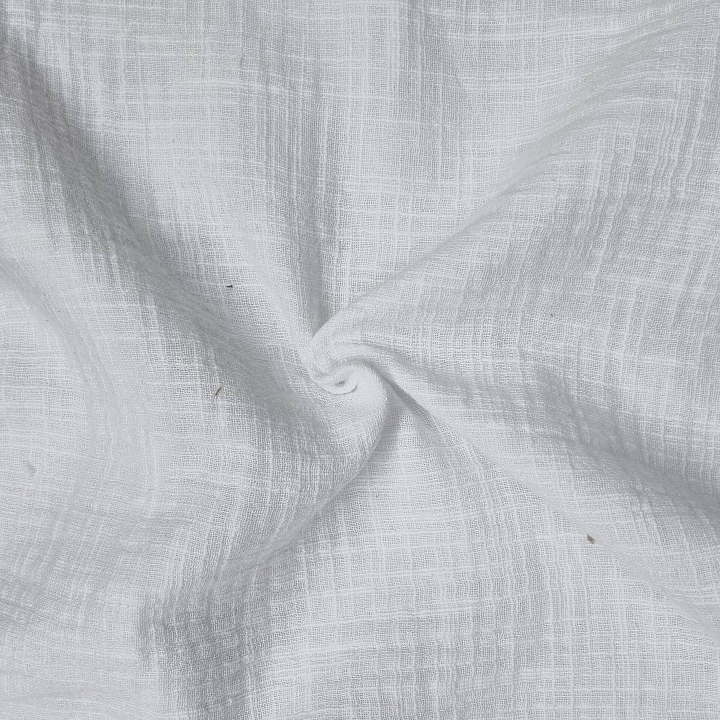 White Fabric With A Textured Pattern
