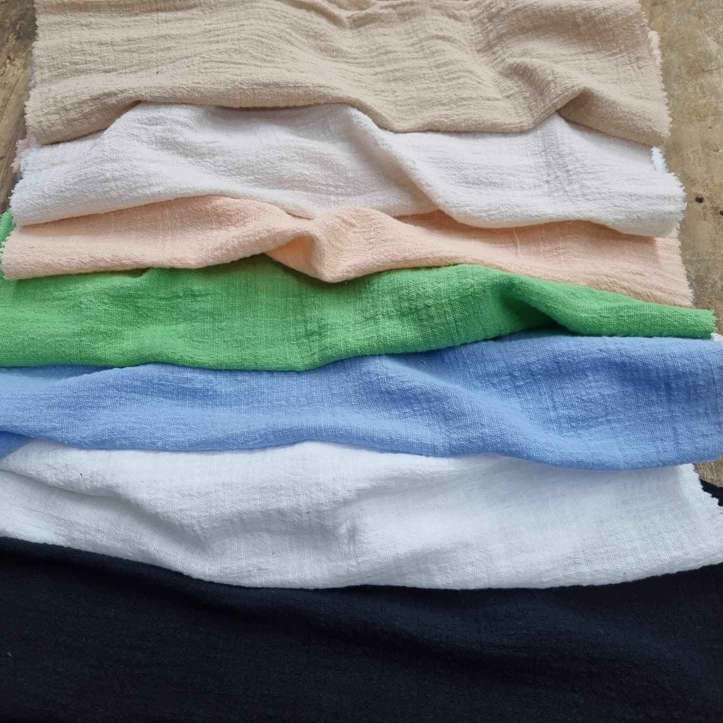 Fabrics With A Textured Pattern In Various Colors 