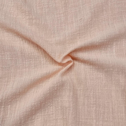 Fabric With A Textured Pattern In Peach