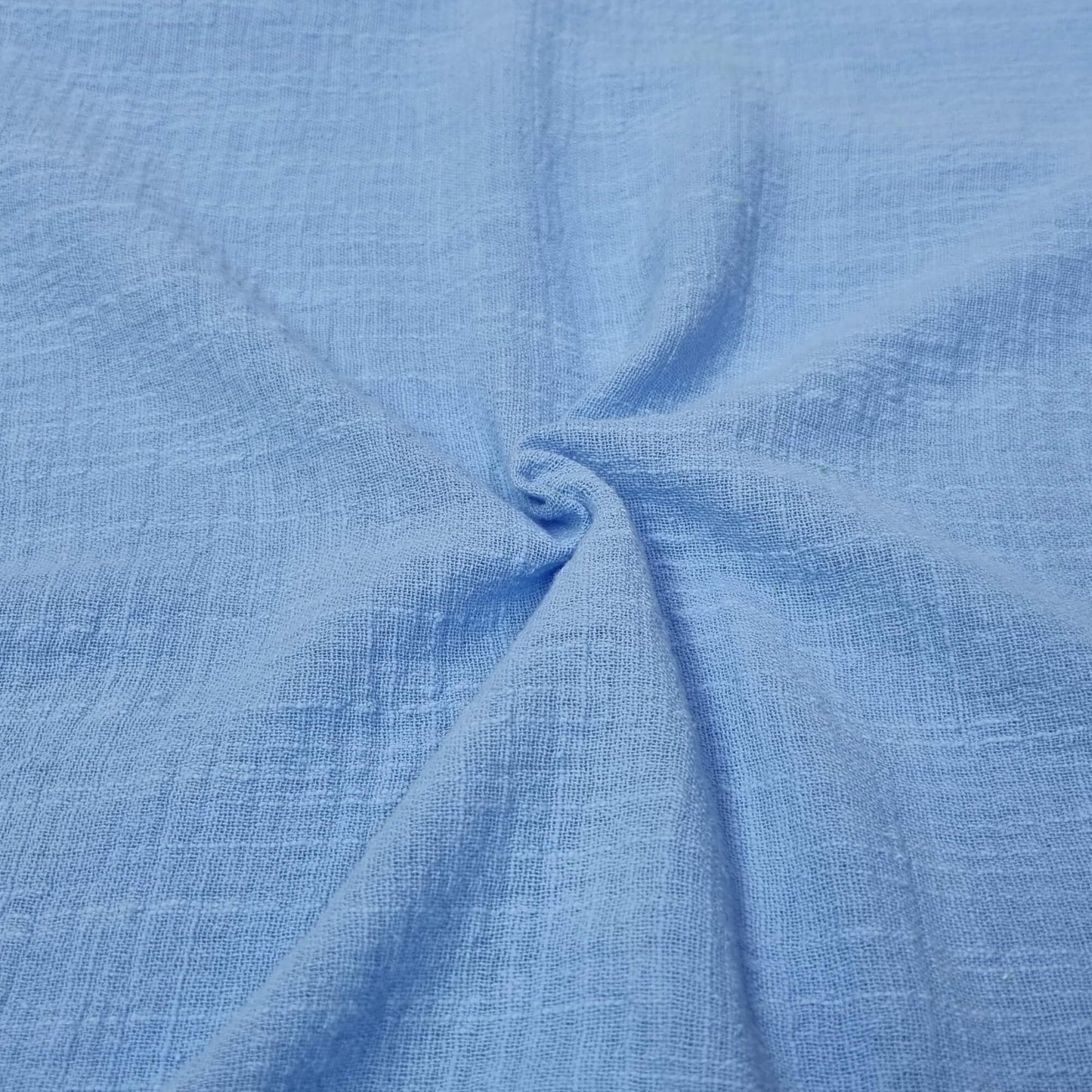 Fabric With A Textured Pattern In Sky Blue