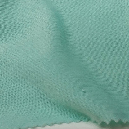 Light Green Fabric With A Smooth Texture