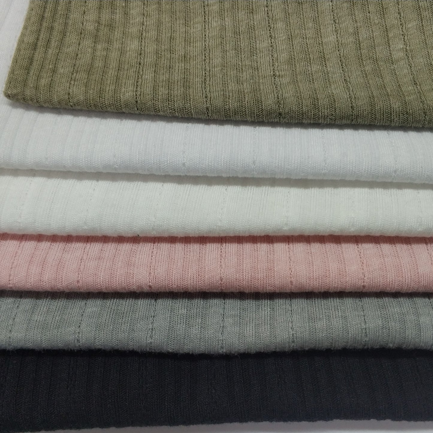 Ribbed knit fabric inspired by the soft texture and stretch of classic undershirts in varius colors