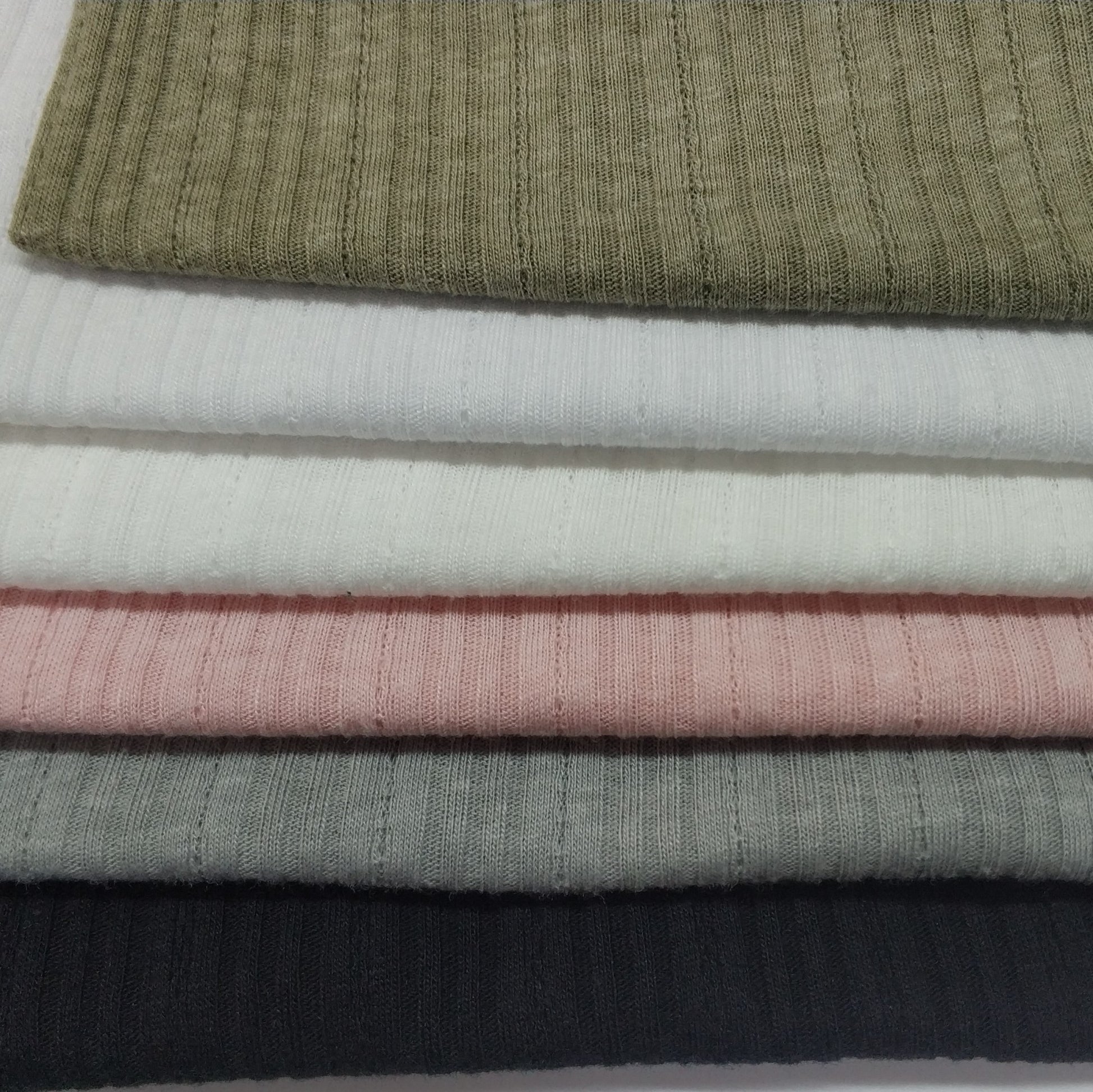 Ribbed knit fabric inspired by the soft texture and stretch of classic undershirts in varius colors