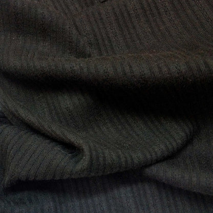 Ribbed knit fabric inspired by the soft texture and stretch of classic undershirts in black