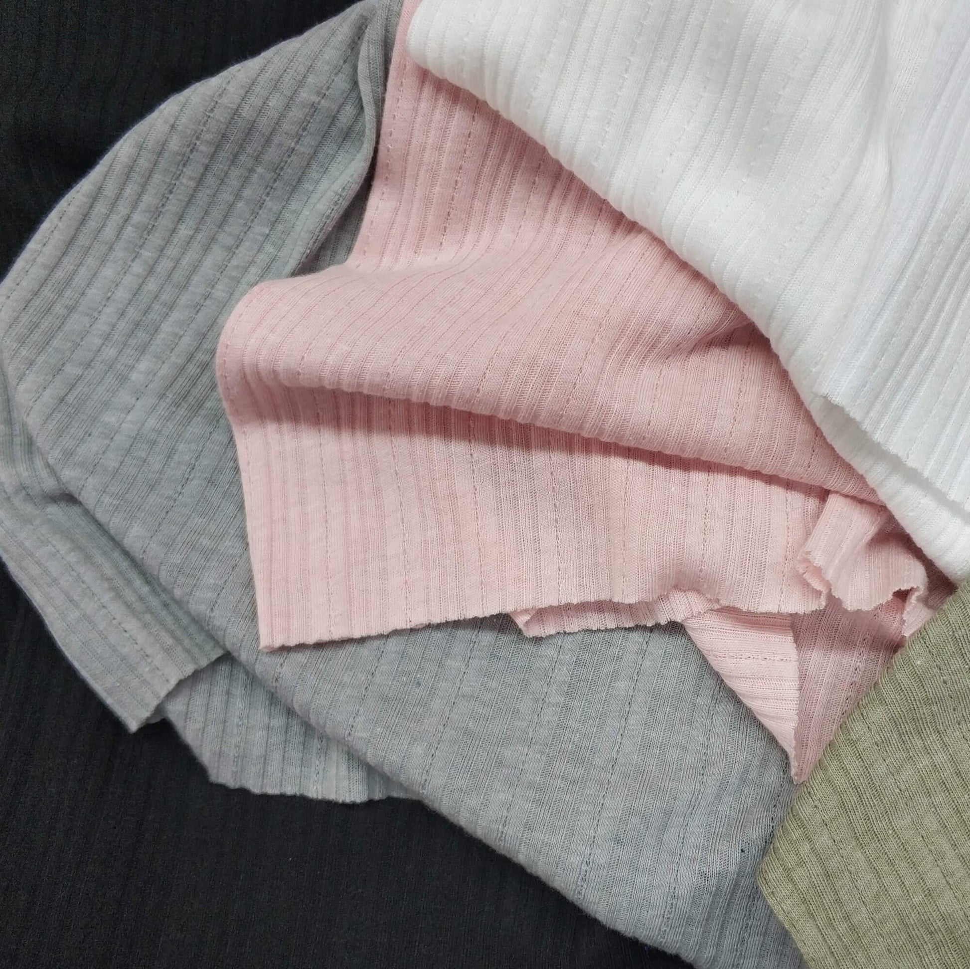 Ribbed knit fabric inspired by the soft texture and stretch of classic undershirts in varius colors