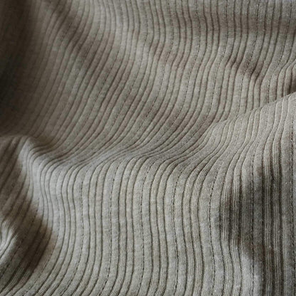 Ribbed knit fabric inspired by the soft texture and stretch of classic undershirts in green