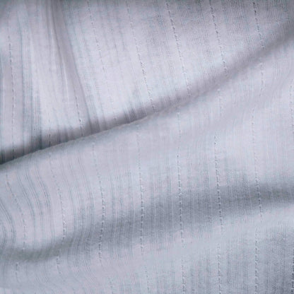 Ribbed knit fabric inspired by the soft texture and stretch of classic undershirts in white