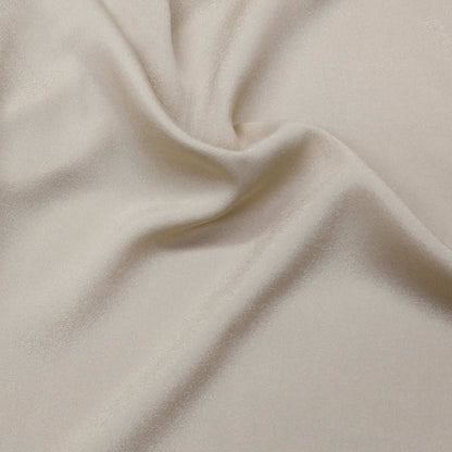 Beige Crepe Fabric With A Subtle Sheen