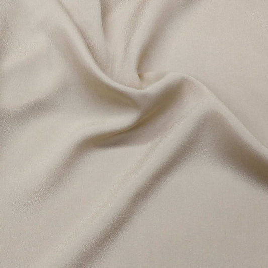 Beige Crepe Fabric With A Subtle Sheen