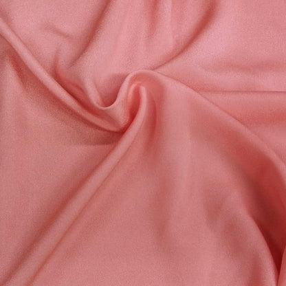 Coral Pink Crepe Fabric With A Subtle Sheen