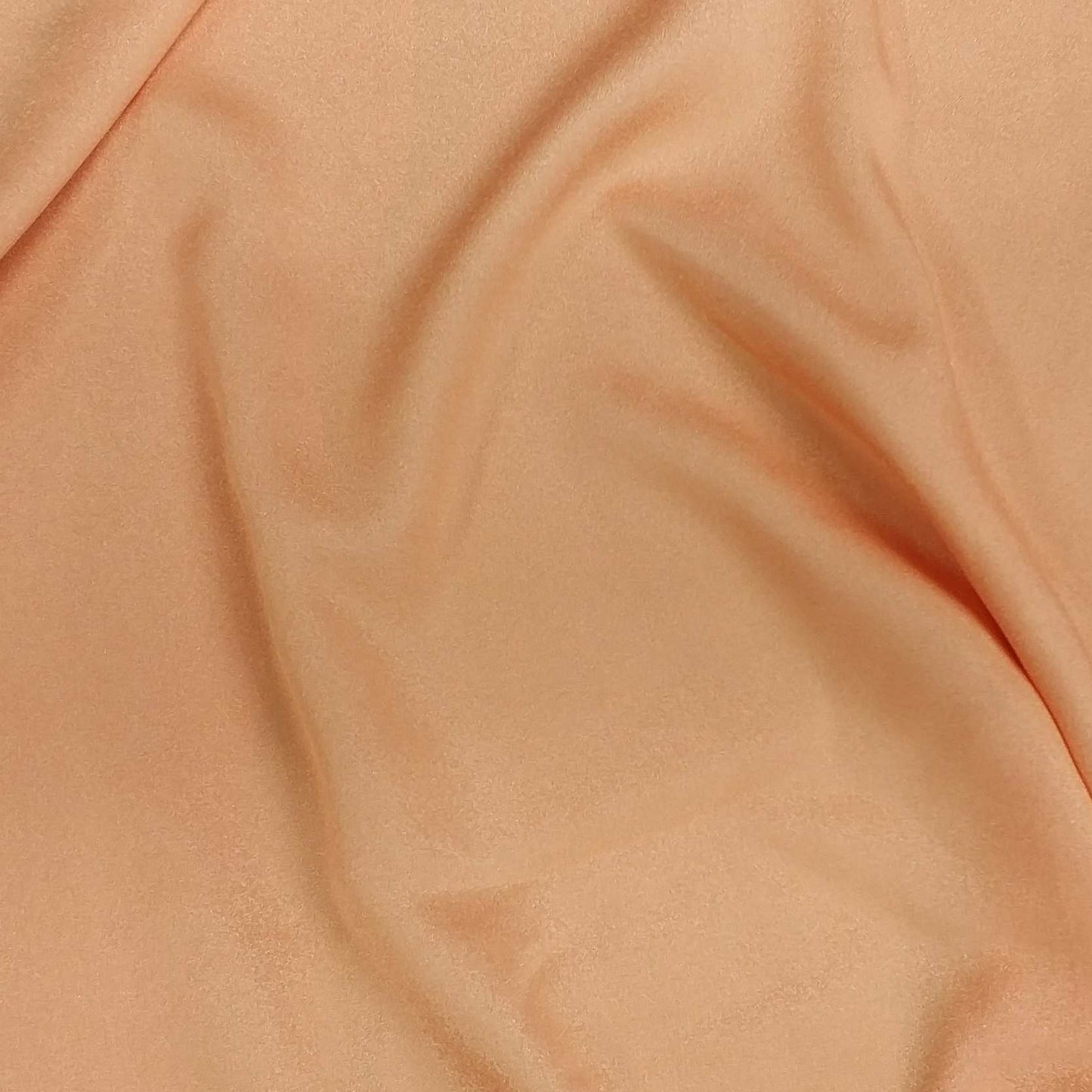 Tangerine Crepe Fabric With A Subtle Sheen