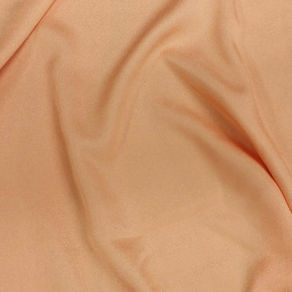 Tangerine Crepe Fabric With A Subtle Sheen