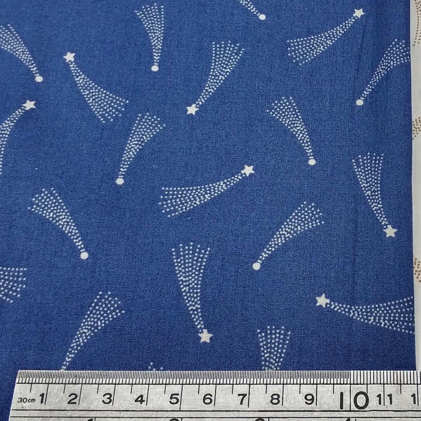 Fabric with star pattern on a blue background