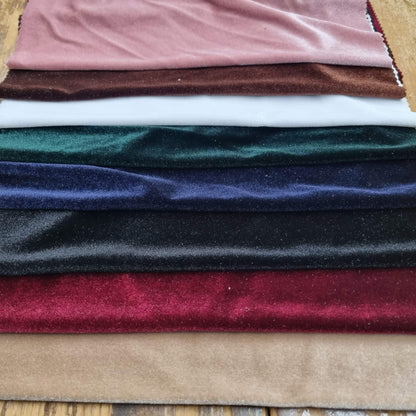 Stack Of Various Colored Velvet Fabrics