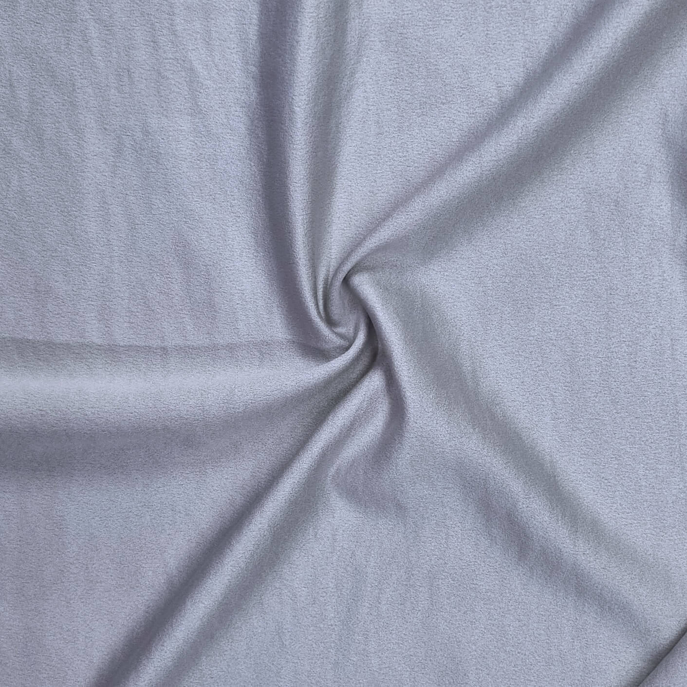 Woven fabric with a slightly crinkled and sand‑washed texture in silver
