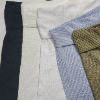 Varius colors of stretch knit fabric with a textured surface