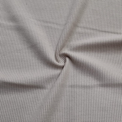 Waffle-textured fabric in light beige