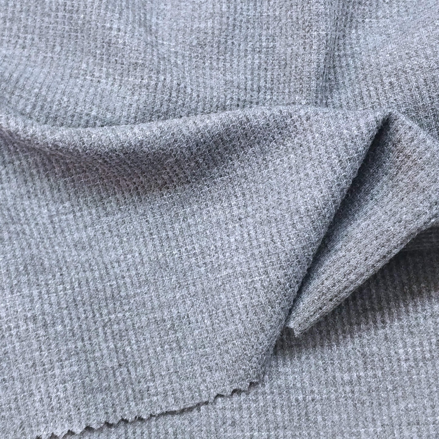 Waffle-textured fabric in light gray melange