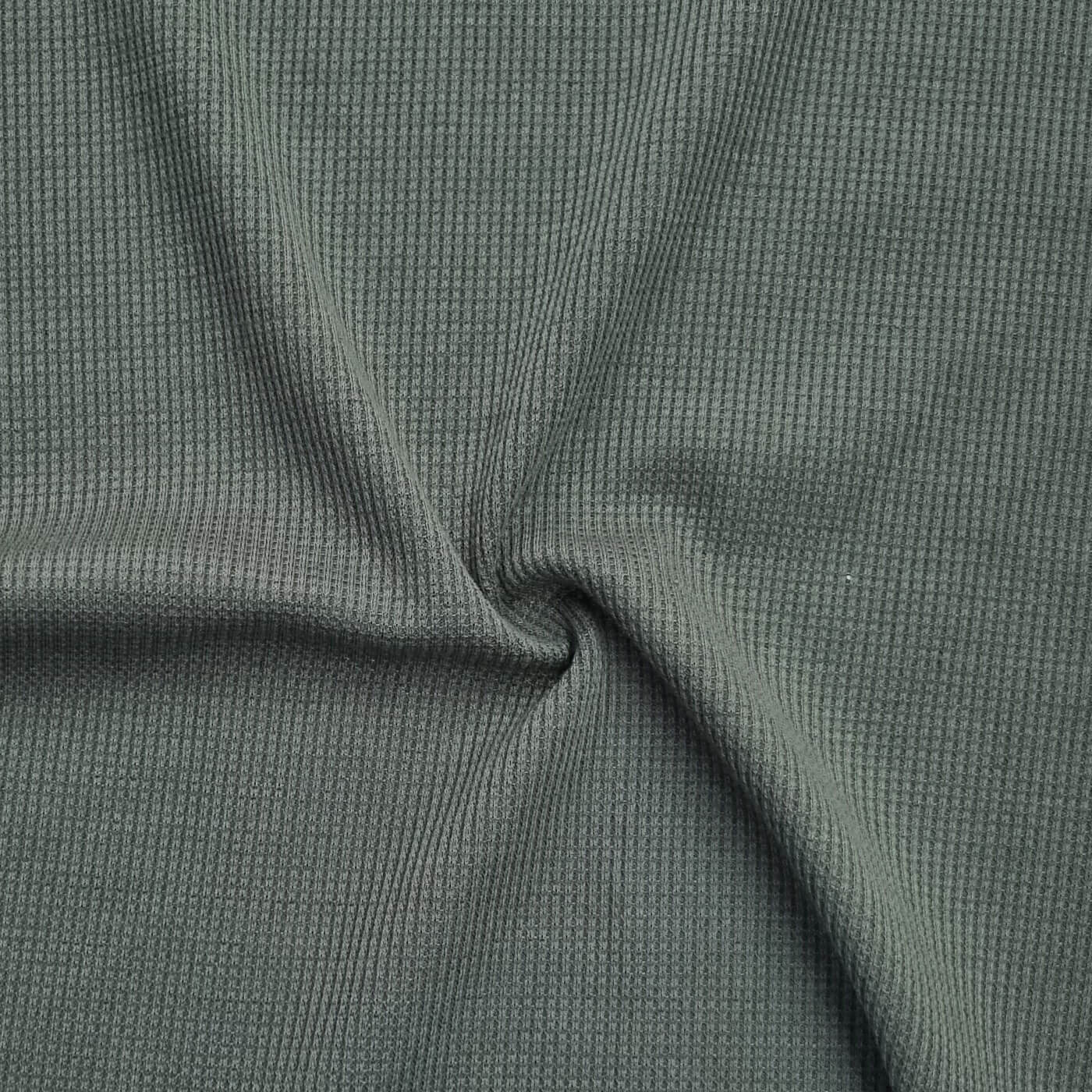 Waffle-textured fabric in moss green