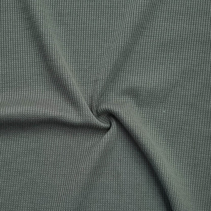 Waffle-textured fabric in moss green