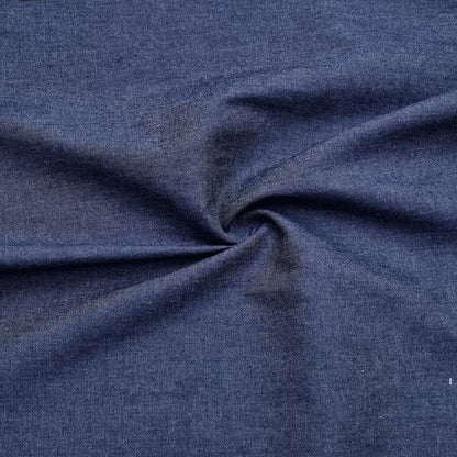 A washed lightweight denim fabric in dark blue