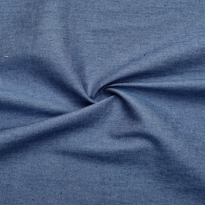 A washed lightweight denim fabric in light blue